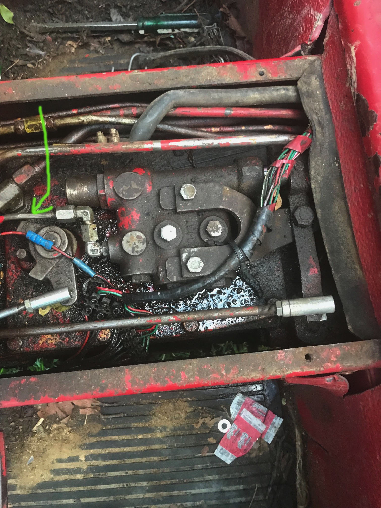 How do I accessed the relief valves. 574 IH Technical IH Talk Red